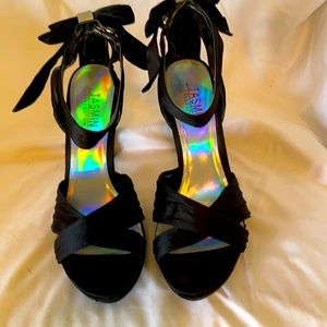 Black heel open toe pump